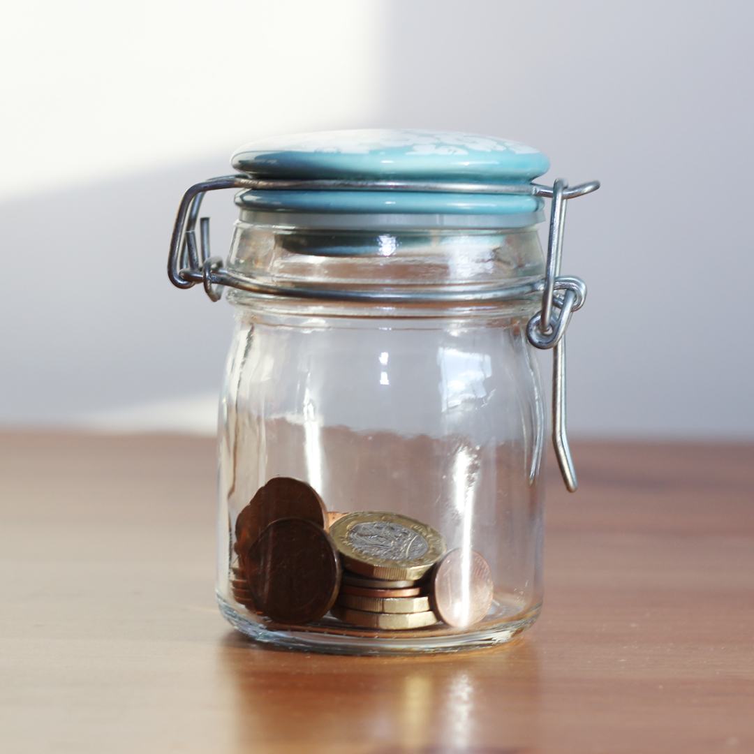 Coins saved in a jar