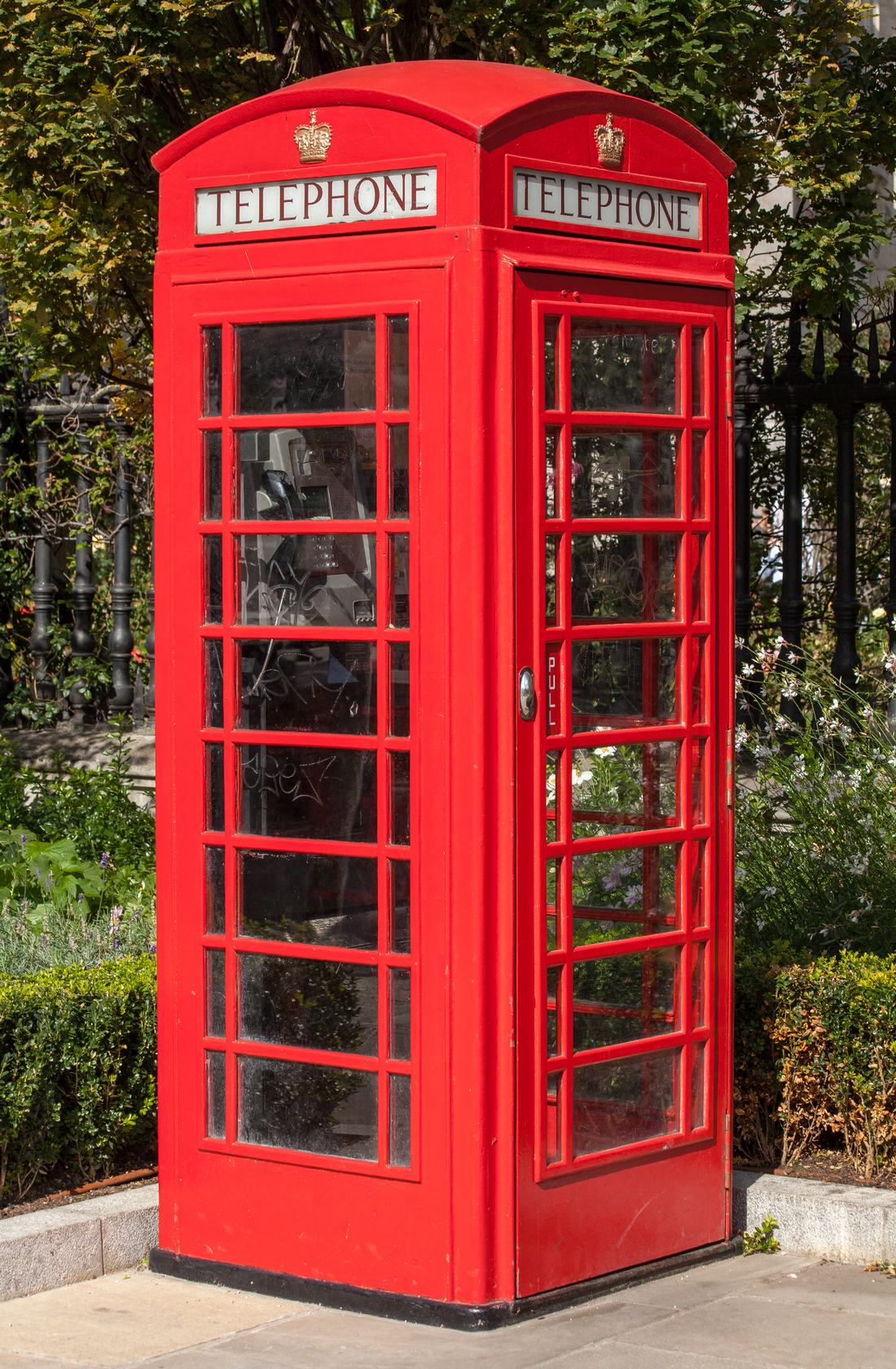 A red telephone box by St Paul's Cathedral