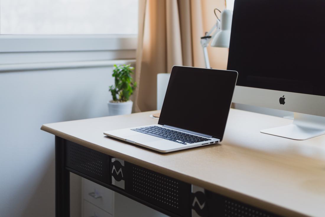 A laptop on a neat desk